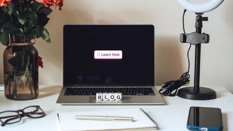 Beginner creating their first piece of content on a laptop without overthinking